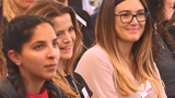 A group of people sitting together at a seminar