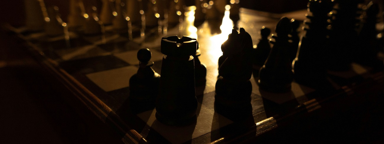 a chess board with chess pieces